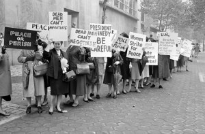 Picketers-representing-an-organization-known-as-Women-Strike-for-Peace-carry-placards-outside-the-United-Nations-headquarters-in-New-York-City-where-the-U.N.-Security-Council-considers-the-Cuban-missile-crisis-in-a-special-m